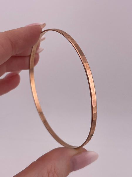 8k rosy yellow gold textured bangle bracelet