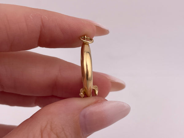 14k yellow gold 3D angel sitting on crescent moon pendant