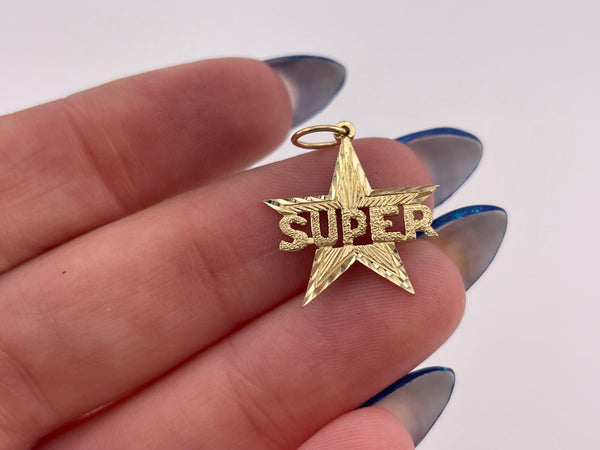 14k yellow gold 'SUPER' star pendant