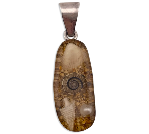 sterling silver shells in resin pendant