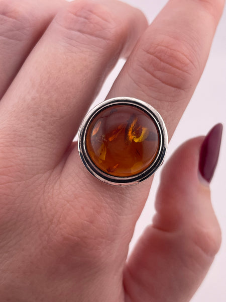 size 8.5 sterling silver round amber ring