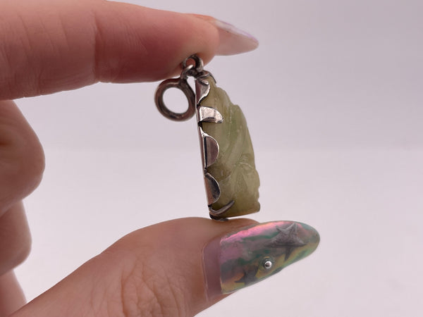 sterling silver Mexican carved stone face pendant