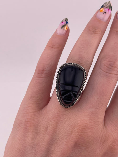 size 6.25 sterling silver rhodium plated carved black onyx face ring