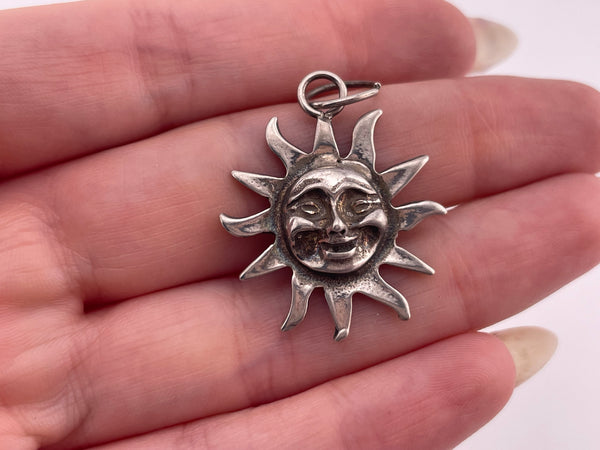 sterling silver sun w/ face pendant