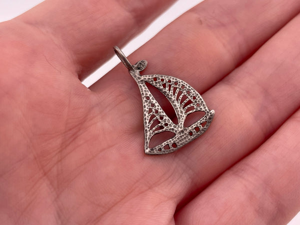 sterling silver sailboat cut-out design pendant