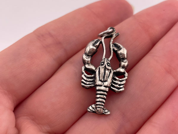 sterling silver rhodium plated lobster pendant