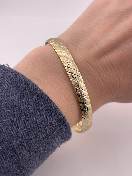 sterling silver 7-3/8" gold plated etched design bangle bracelet