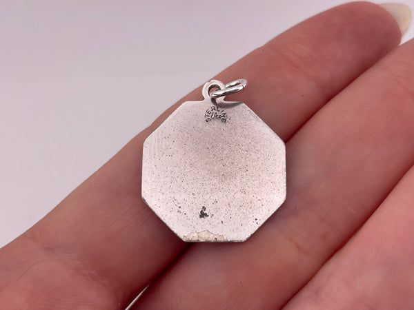 sterling silver rhodium plated "I'll Never Stop Loving You" stop sign pendant