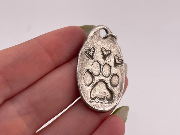sterling silver paw print heart pendant