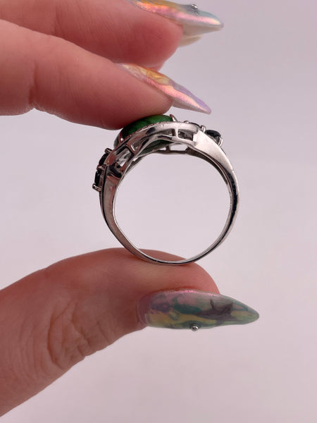 size 9.25 sterling silver rhodium plated green gemstone ring