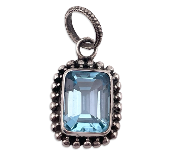 sterling silver faceted lab topaz pendant