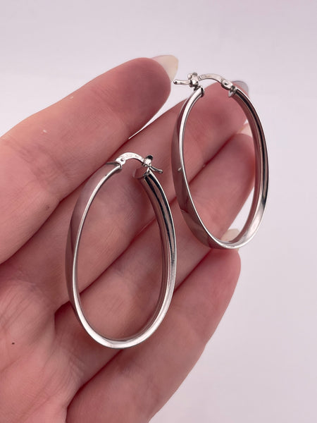 sterling silver 1-1/2" rhodium plated wavy oblong hoop earrings