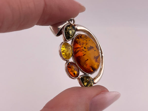 sterling silver tri-color amber pendant