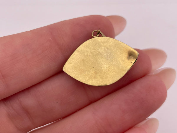 14k yellow gold blue glass eye pendant *dents*
