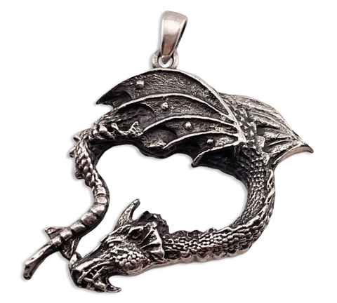 sterling silver bending dragon pendant