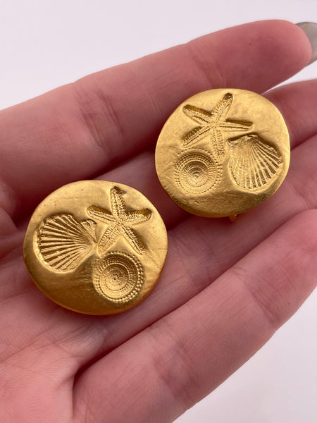 costume Trifari gold tone nautical clip on earrings