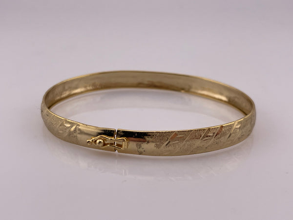 sterling silver 7-3/8" gold plated etched design bangle bracelet