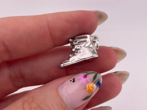 sterling silver rhodium plated baby shoe pendant