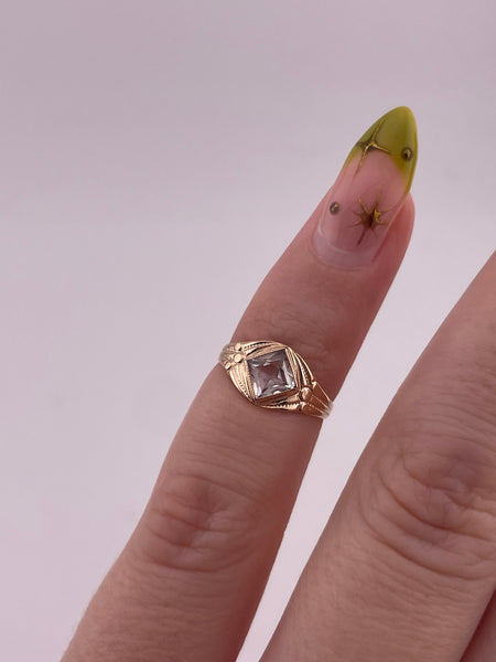 size .75 10k yellow gold faceted rhinestone ring