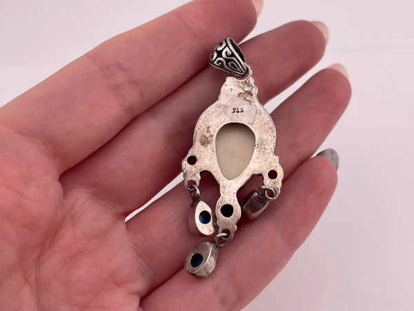 sterling silver plastic face synthetic turquoise faceted garnet iolite pendant