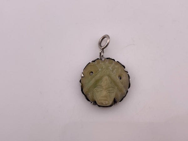 sterling silver Mexican carved stone face pendant