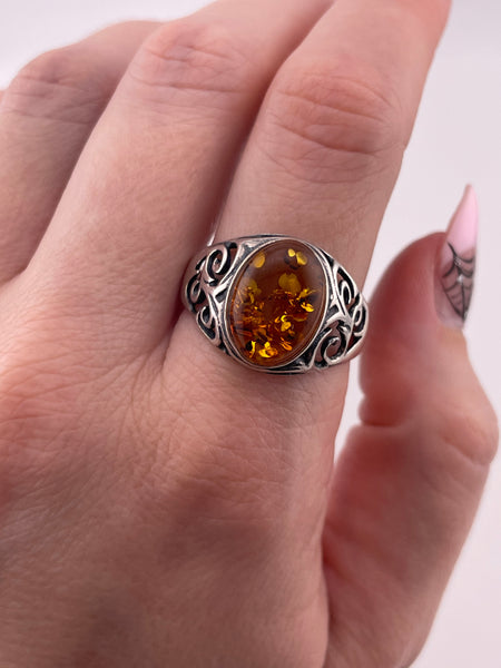 size 12 sterling silver oval amber swirl design ring