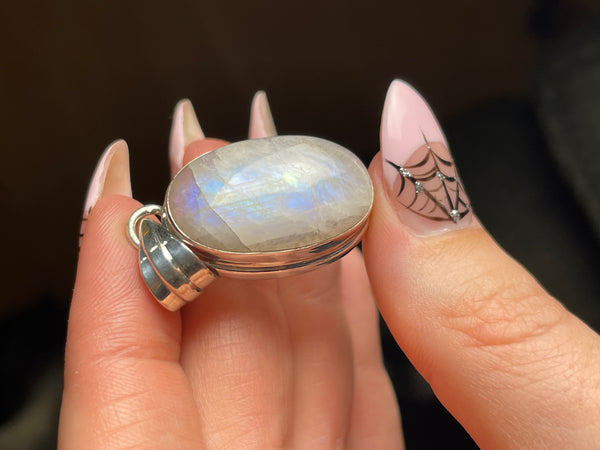 sterling silver oval rainbow moonstone pendant