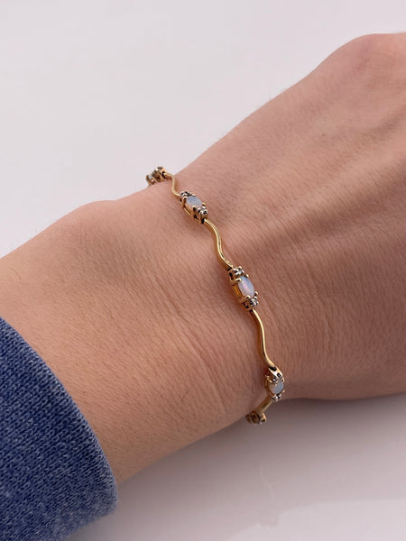 14k yellow gold opal & diamond squiggle link bracelet