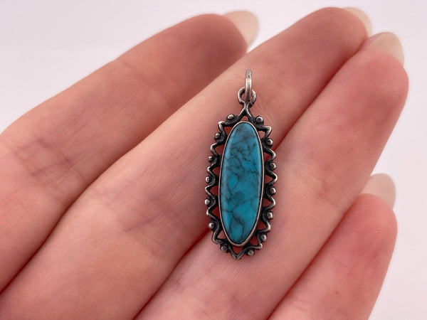 sterling silver synthetic turquoise pendant