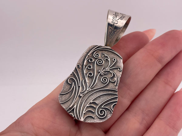 sterling silver 2-1/2" Desert Rose Trading amethyst pendant