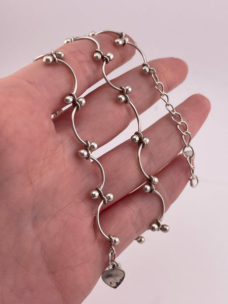 sterling silver curved ball necklace