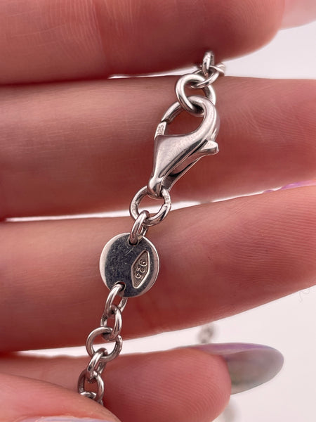 sterling silver designer Movado spacer diamond dangle necklace