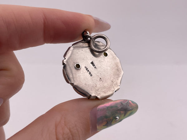 sterling silver Mexican carved stone face pendant