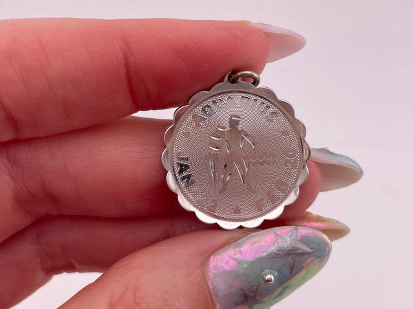 sterling silver rhodium plated Aquarius the Water bearer zodiac pendant