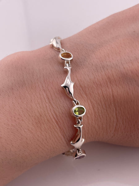 sterling silver 6-7/8" rhodium plated faceted multi-stone dolphin bracelet