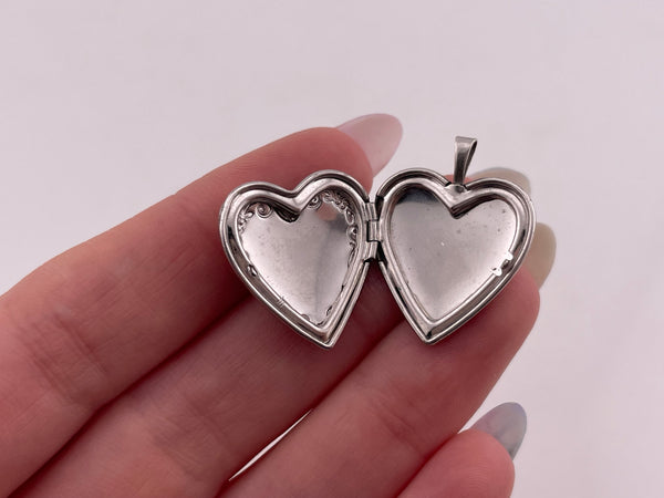 sterling silver 'Love' heart shape pressed locket pendant