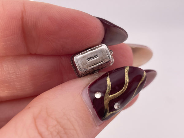 sterling silver rhodium plated cat or dog? in basket pendant