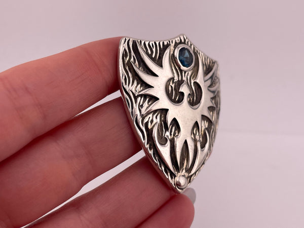 sterling silver Tribal Sons faceted blue glass shield pendant