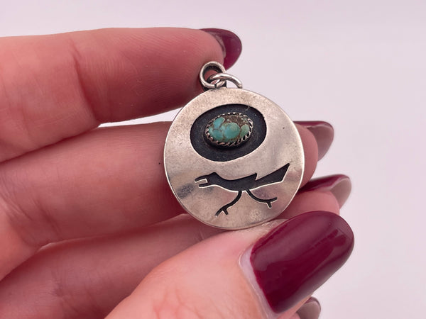 sterling silver roadrunner turquoise pendant