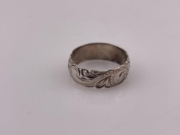 size 10.25 sterling silver “Kuuipo" flower scroll band  ring