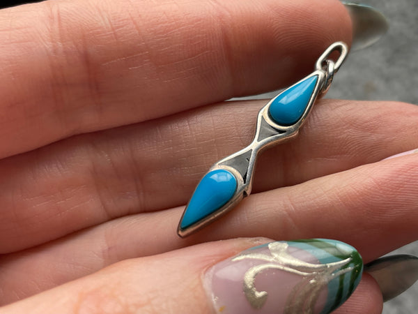 sterling silver stabilized turquoise & black resin pendant