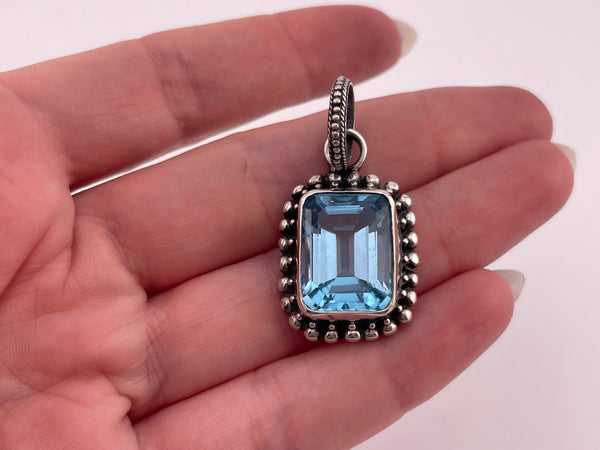 sterling silver faceted lab topaz pendant