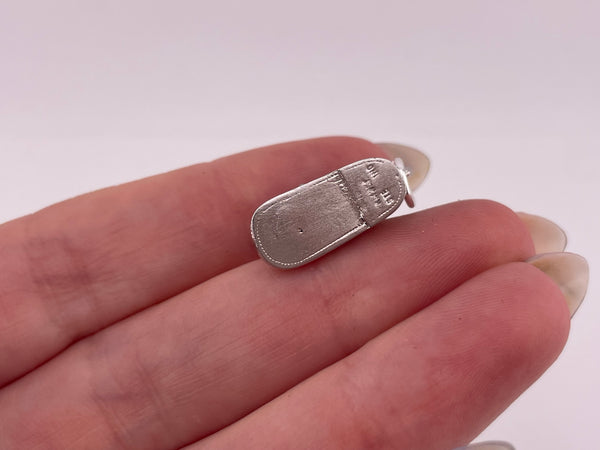 sterling silver rhodium plated baby shoe pendant