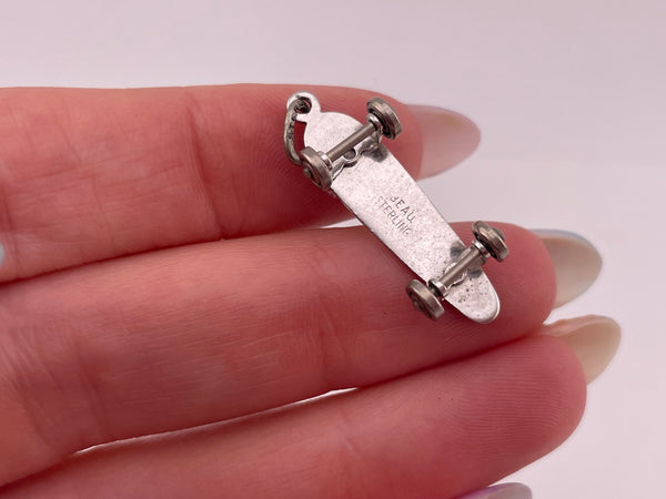 sterling silver rhodium plated skateboard pendant