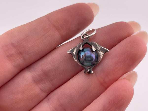sterling silver dolphin blue glass gazing ball pendant