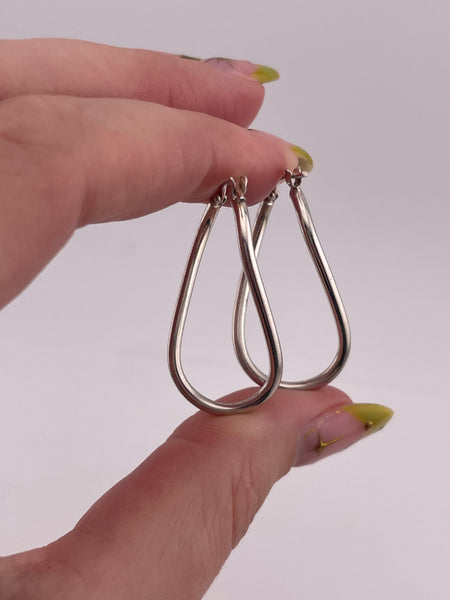 sterling silver oval wavy hoop earrings