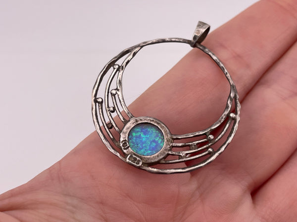 sterling silver synthetic blue opal pendant