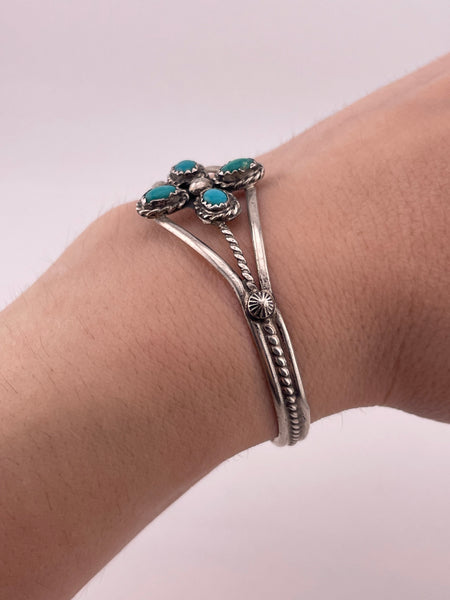 sterling silver 6-3/8" four stone turquoise twsited design bracelet