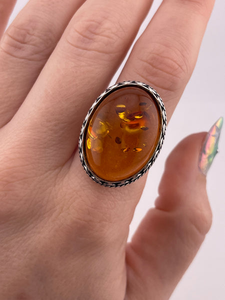 size 8 sterling silver scallop design oval amber ring