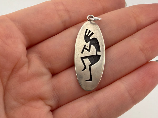 sterling silver Kokopelli overlay pendant